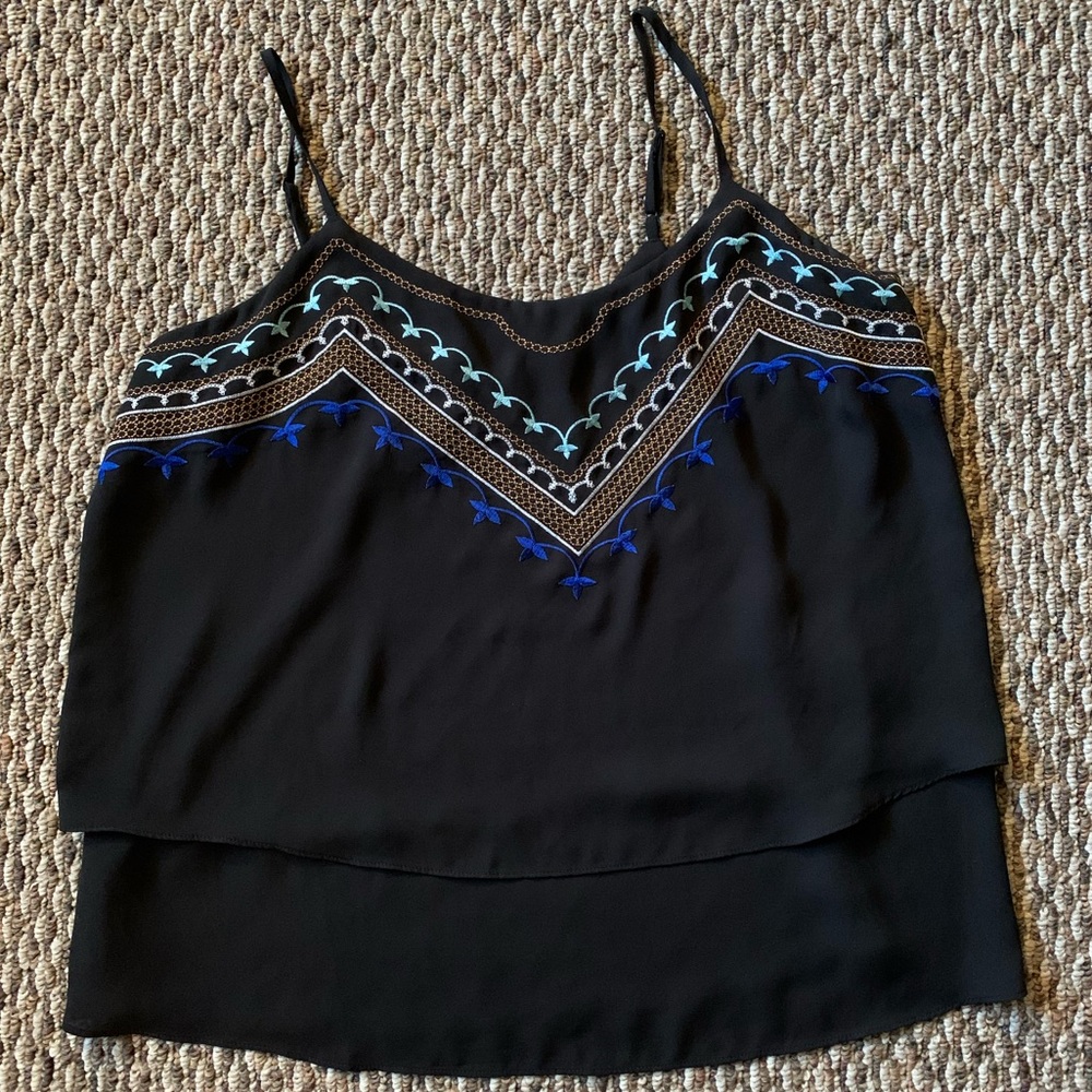Black layered tank top with embroidered detailing